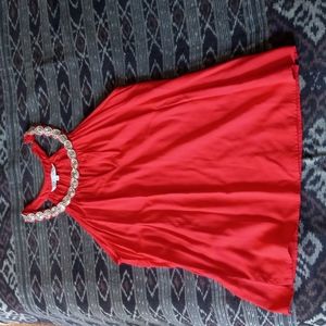 Red flowy jewel neck shirt